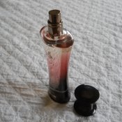 Spray bottle of perfume.