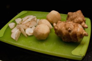 Sunchokes being Sliced for Stir Fry