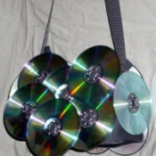 Purse decorated with CDs.