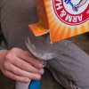 Pouring Baking Soda for Balloon Experiment