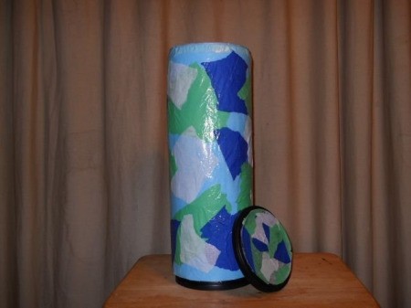 Coffee Container Toilet Roll Holder, covered in decorative tissue paper