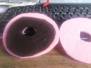 Pink and brown felt cut into donut shapes