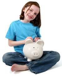 Young Girl Holding Piggy Bank