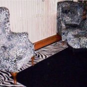 Refurbished chairs in a zebra print.