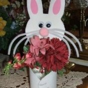 Bunny vase made from glass jar.