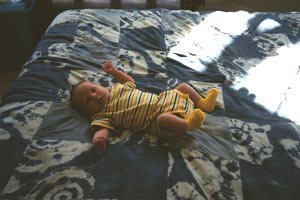 Baby on Blue Quilt
