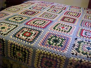 A colorful granny square afghan.
