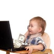 Child With Laptop, Money and Cell Phone