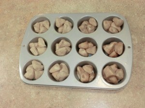 Four pieces of sugar coated biscuit per muffin cup.