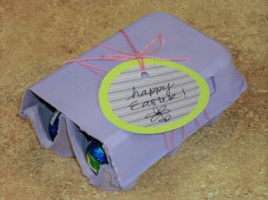 Filled egg crate with gift tag.