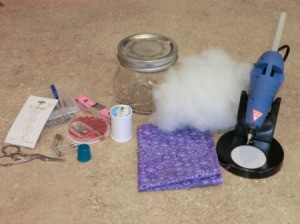 Supplies for Mason jar pincushion and sewing kit.