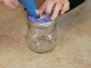Gluing fabric to underside of lid.