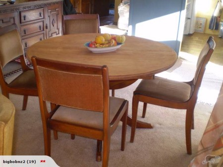 Round dining table and four chairs.