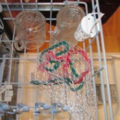 Cookie cutters inside a mesh bag in the dishwasher