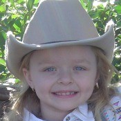 little girl in cowgirl hat