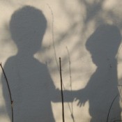 Shadows of Boys holding hands