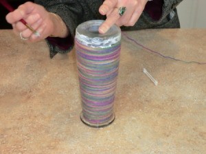 Applying Modge Podge with paint brush.