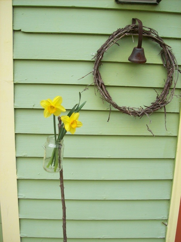 Recycled jar gaden vase on its own.