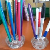 Glass frog pencil holders.