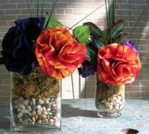 Beautiful coffee filter flowers in jars fiilled with rocks