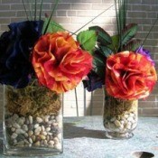Beautiful coffee filter flowers in jars fiilled with rocks