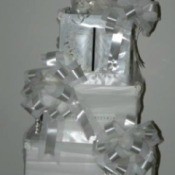 White fake cake of boxes and bows