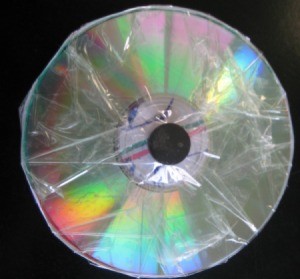 Back of CD with magnet taped on