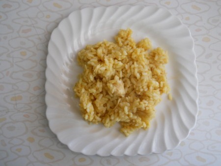 Curried chicken and rice on plate