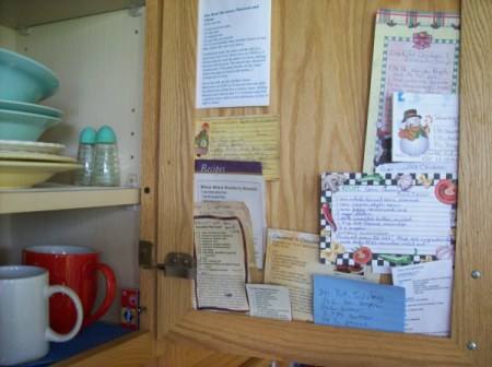 Recipes tucked inside cabinet door.