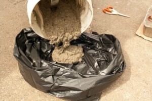 Pouring Concrete into Garbage Bag for Hypertufa Pot