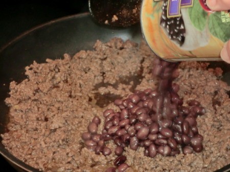 Cooking Meat and Bean Mixture