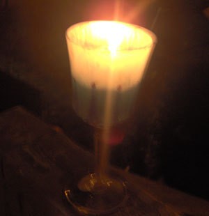 Lit Recycled Goblet Candle Holder