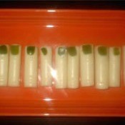 String cheese and bell pepper cheesy zombie fingers