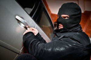 Thief Breaking into Car