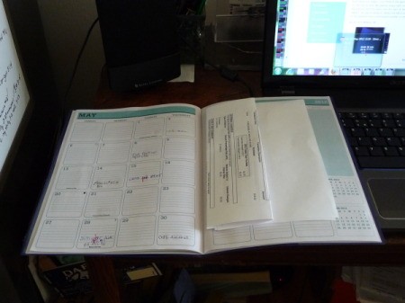 A monthly planner for organizing bills.