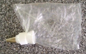 Use the cake mix bag as a frosting bag.