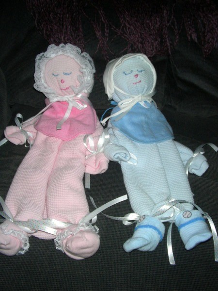 Baby blanket decorative dolls.