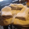 White fur coat to be stored.