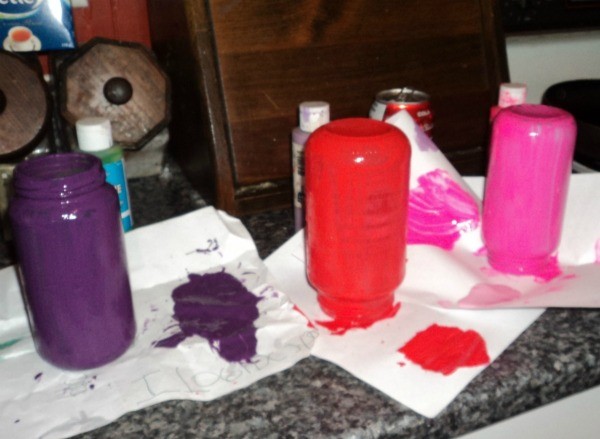 Purple, red and Pink painted glass jars