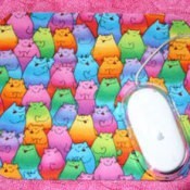 Mousepad with a cat fabric motif.