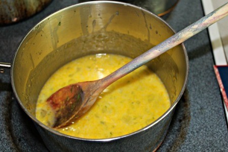 eggs, lime juice, lemon juice, sugar, and lime zest in pan on stovetop