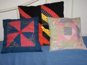 Pillows made from quilt squares.