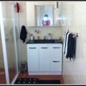 White vainty with black sink top.