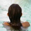 Girl with Long Hair in Swimming Pool