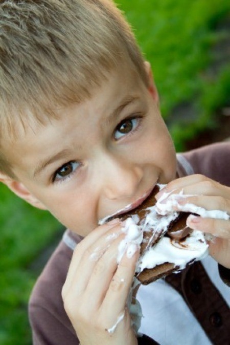 Boy Eating S'mores