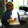 A preschooler working on his letter of the day