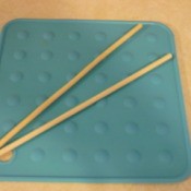 Chopsticks on silicone pot holder.