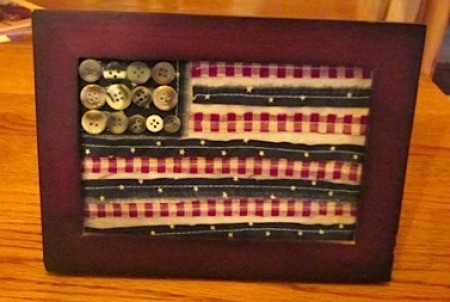 Scrappy framed flag with button "stars".