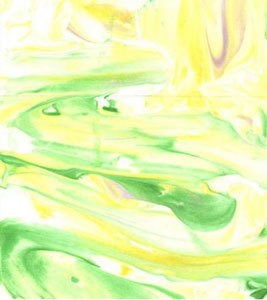 Closeup of green and yellow tie dye paper.