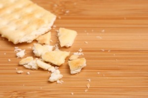 Cracker Crumbs on Wooden Cutting Board